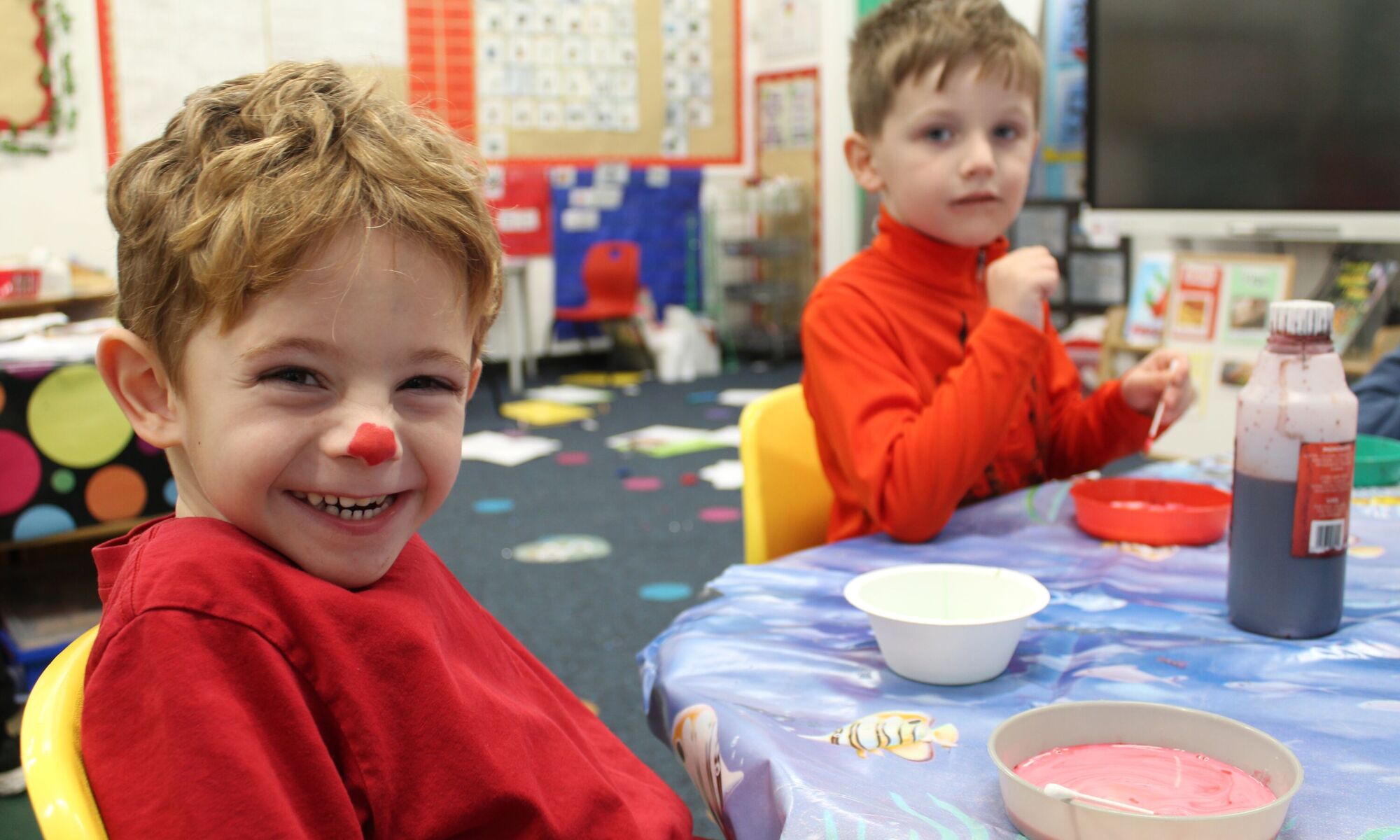 Two childen looking at camera